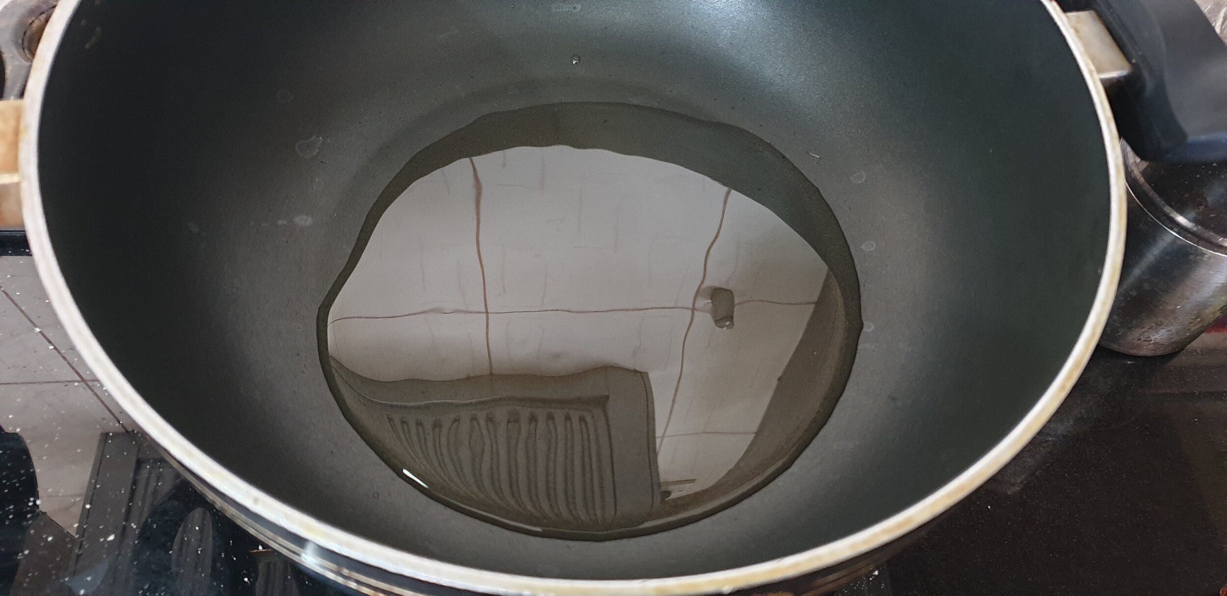 Heat oil in a Kadhai